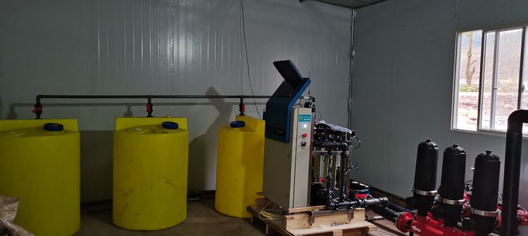 Multi-span glass greenhouse installation attention